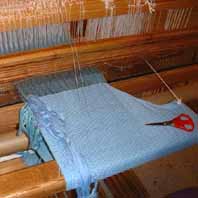 a V-shawl on the loom